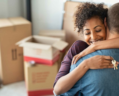 couple hugging on move in day